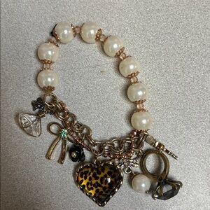 Elegant Gold and Pearl Charm Bracelet